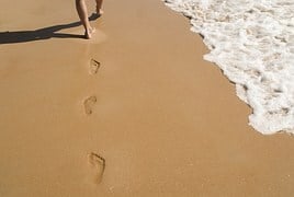 footsteps in sand