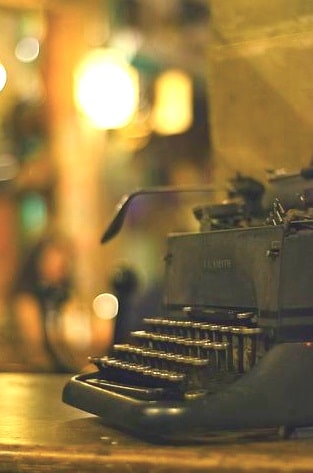 A poem by Tricia McCallum. Photo of vintage typewriter.